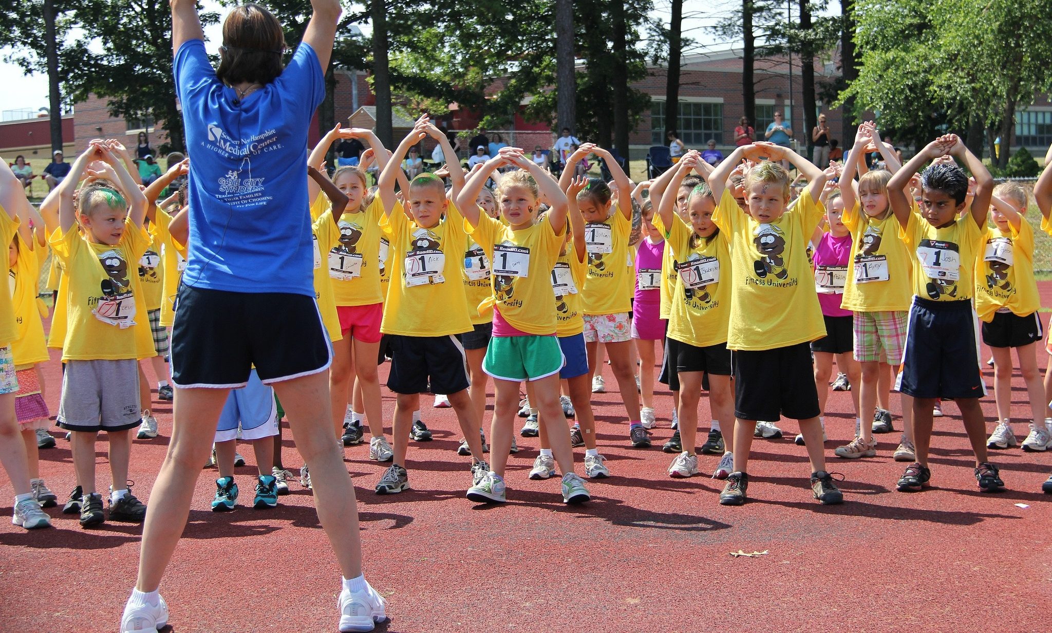 In the Community Hero Image - Fitness University 1 Kids warming up at Fitness University