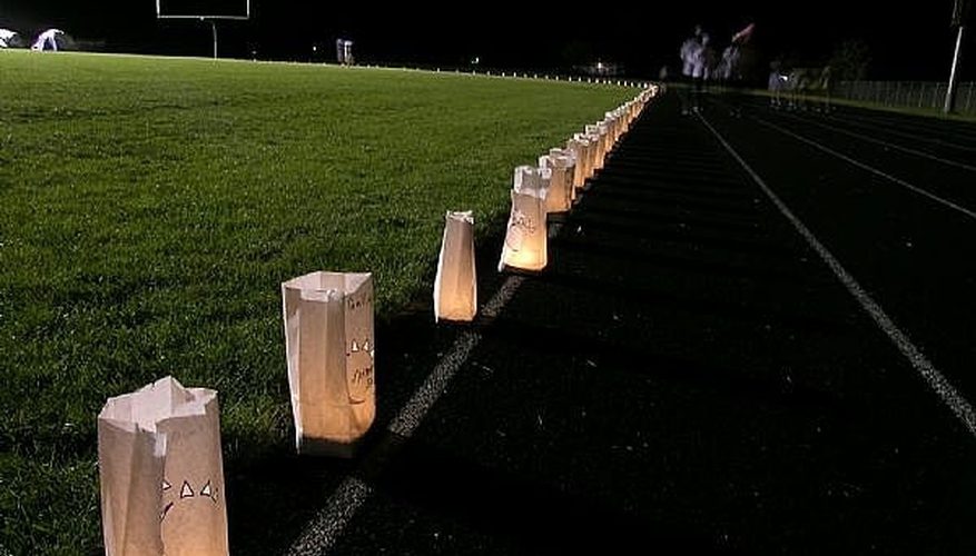 Candle Light Relay Candles lit for the annual Candle Light Relay track workout