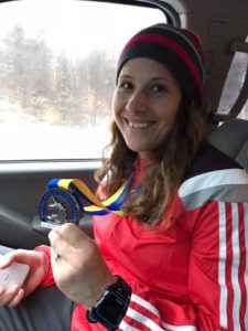 Susanne showing off her 2018 Boston Marathon medal!