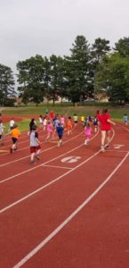 Kids running track. Because that never gets old.