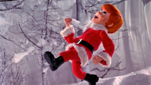 Kris Kringle running up the Mountain of the Whispering Winds