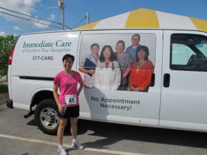 At the 2011 Medical Center 6K, with Melissa's Immediate Care photo on the Immediate Care van