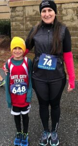 Johanna and her son Jack before the start of The Great Gobbler last year. Jack runs cross country with the PAL Gate City Striders